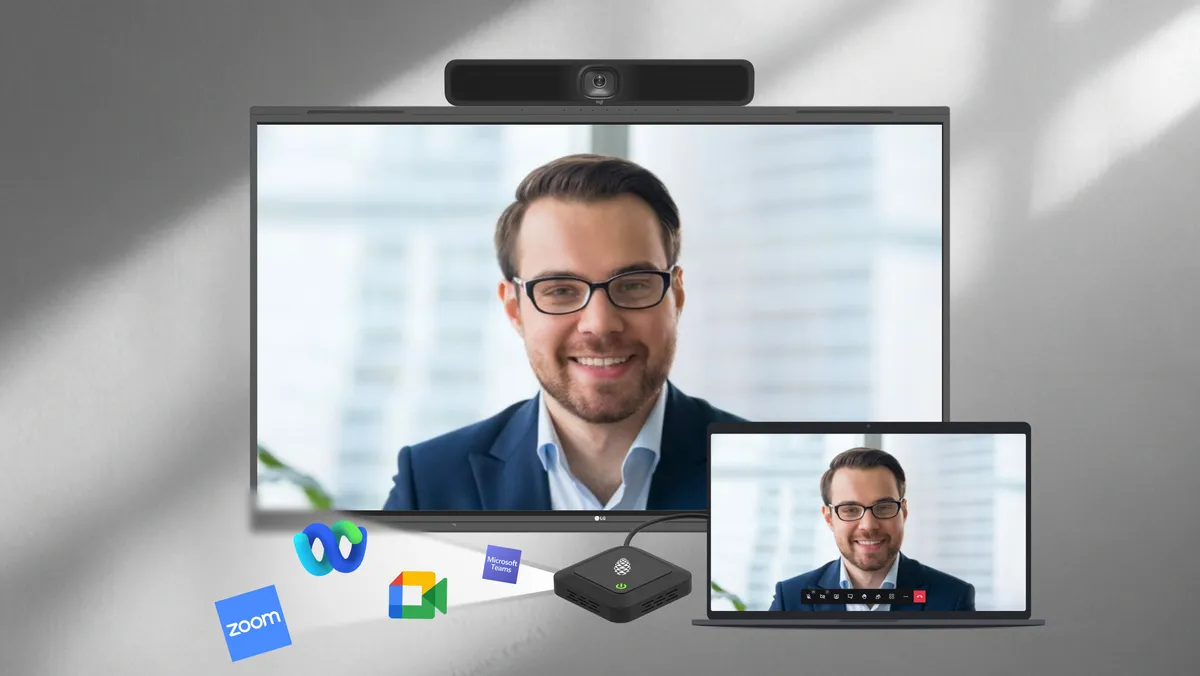 A laptop hosting a call through a BYOM dongle on an LG CreateBoard