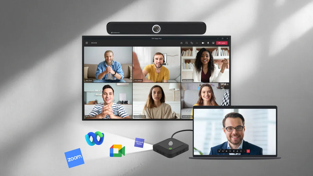 A laptop hosting a call and casting to the room PC