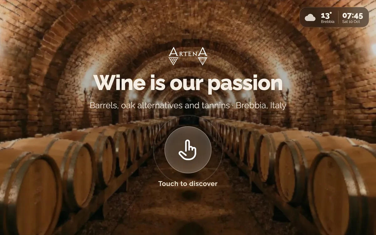 The attract screen of the same story: a barrel cellar, the Artena logo, the headline and a "Touch to discover" prompt.