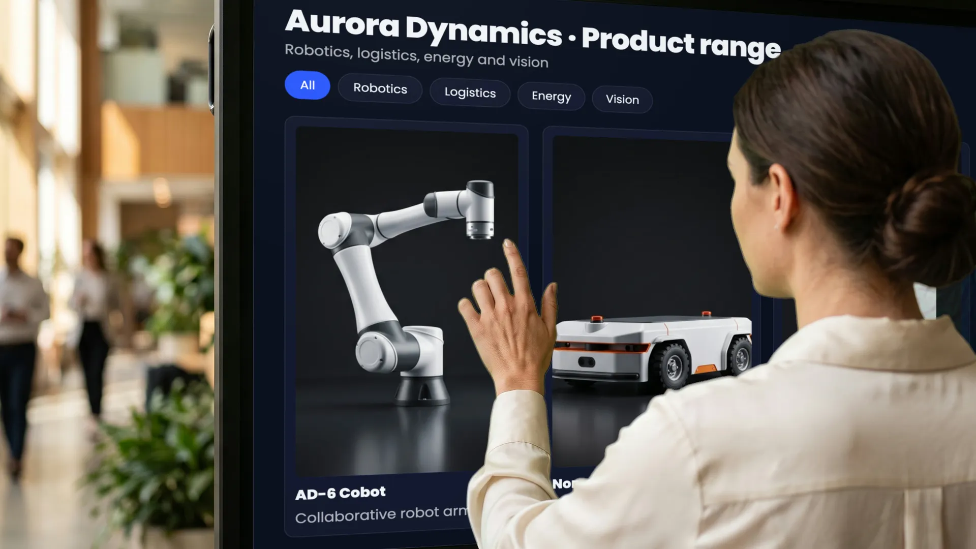 A visitor touching the product range on a showroom screen.