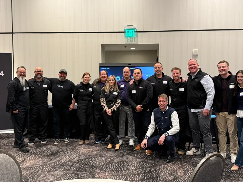 Full Neat and Mago team group photo at the Experience Neat 2026 roadshow event