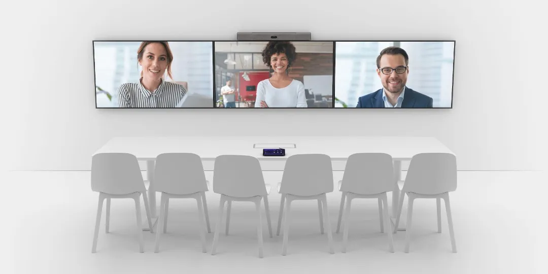The same three displays during a video call, with one remote participant filling each screen.