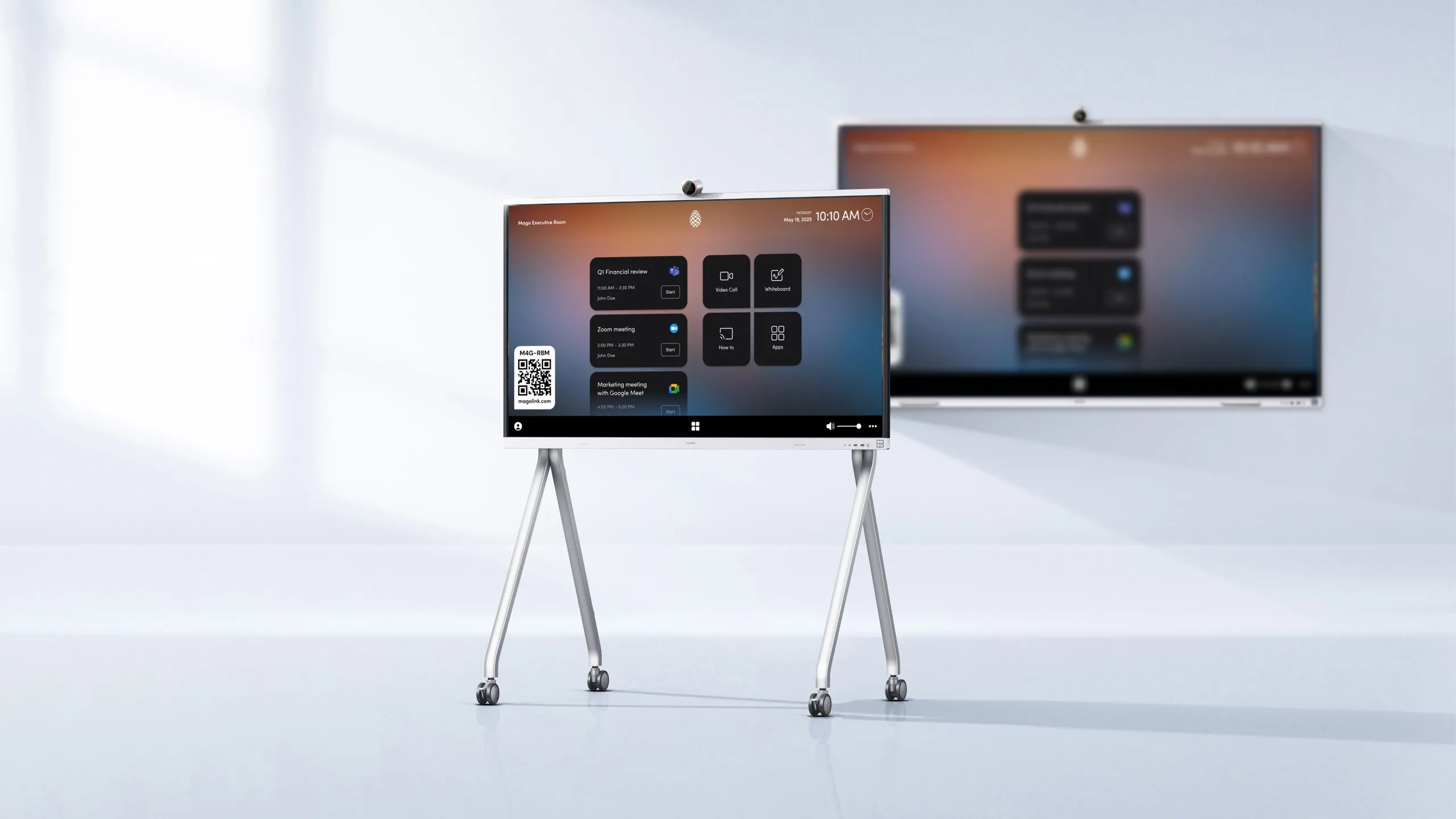 Two Huawei IdeaHub displays running Mago in a bright meeting space