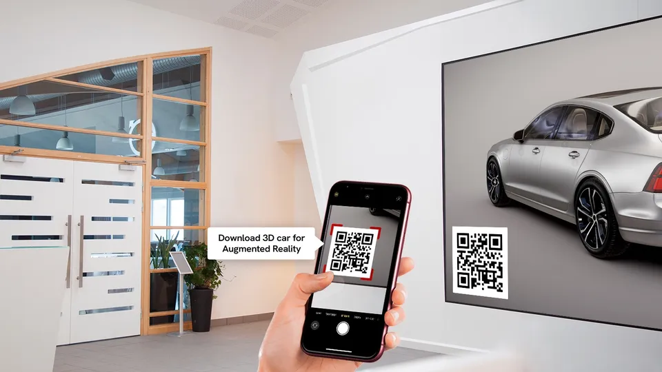 A showroom with a display showing Mago Stage and a phone scanning a QR code